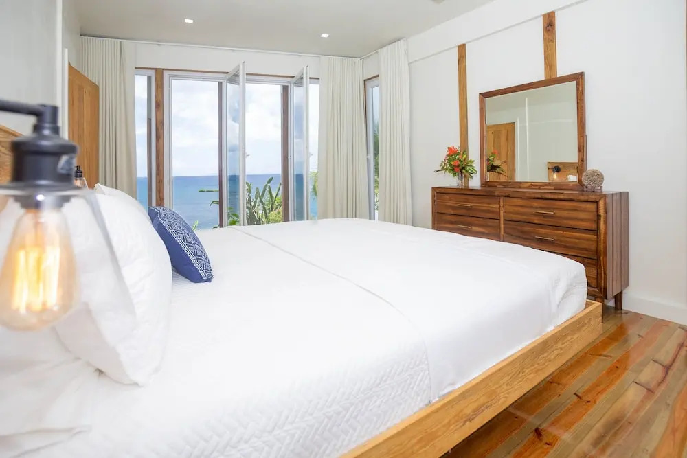 Awesome Over The Water Overlooking West End - Aire Agua 3 Bedroom Home by RedAwning