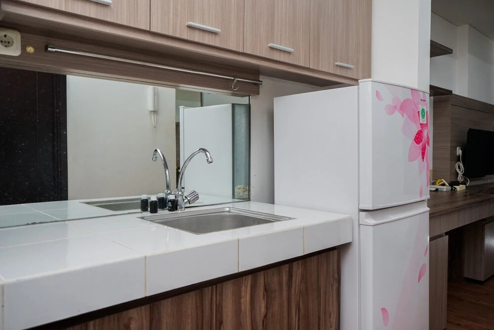 Comfort And High Floor Studio Room At Casa De Parco Apartment