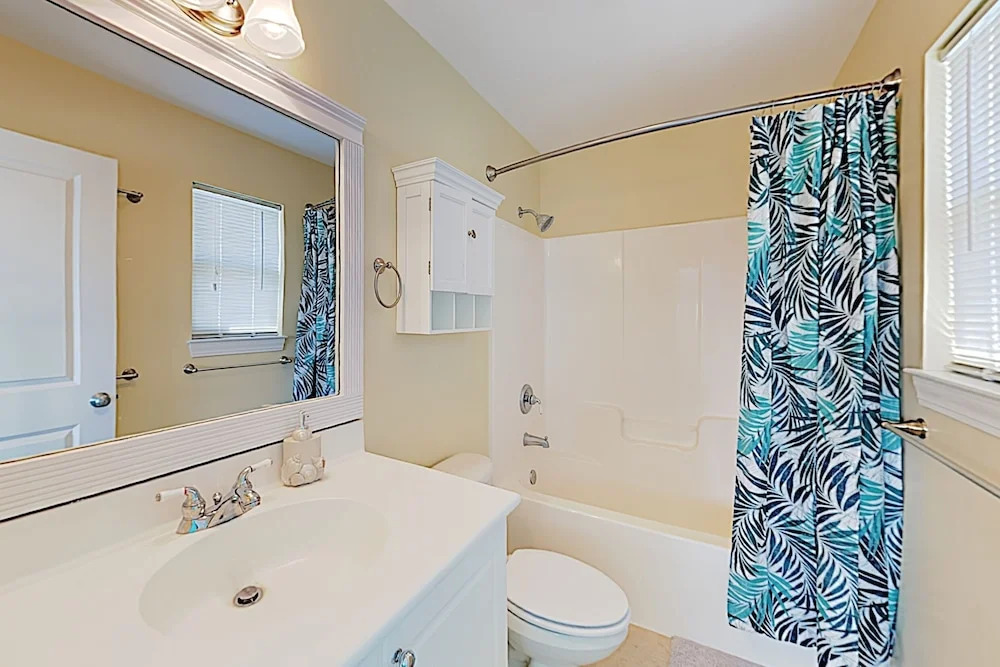 New Listing! Coastal Gem W/ Balconies, Near Beach 4 Bedroom Duplex