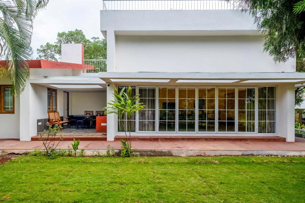 StayVista's Villaggio - Orchard Oasis with Pool, Expansive Lawn, Patio & Indoor Activities