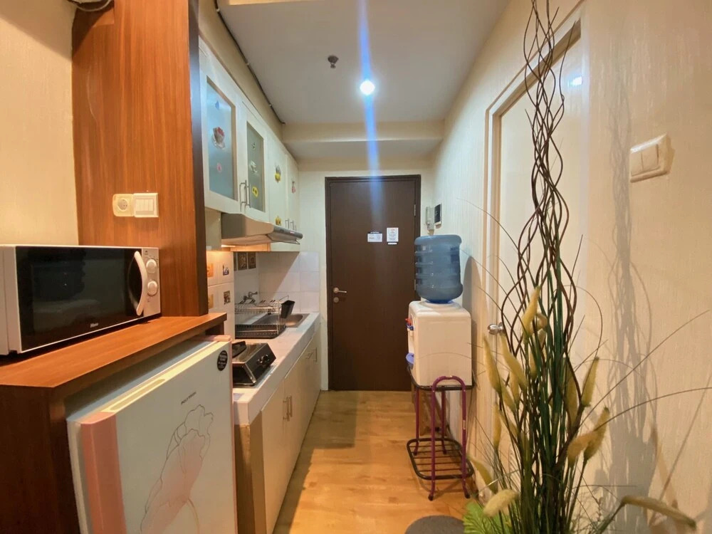 Cozy And Well Designed Studio Room At Suites @Metro Apartment