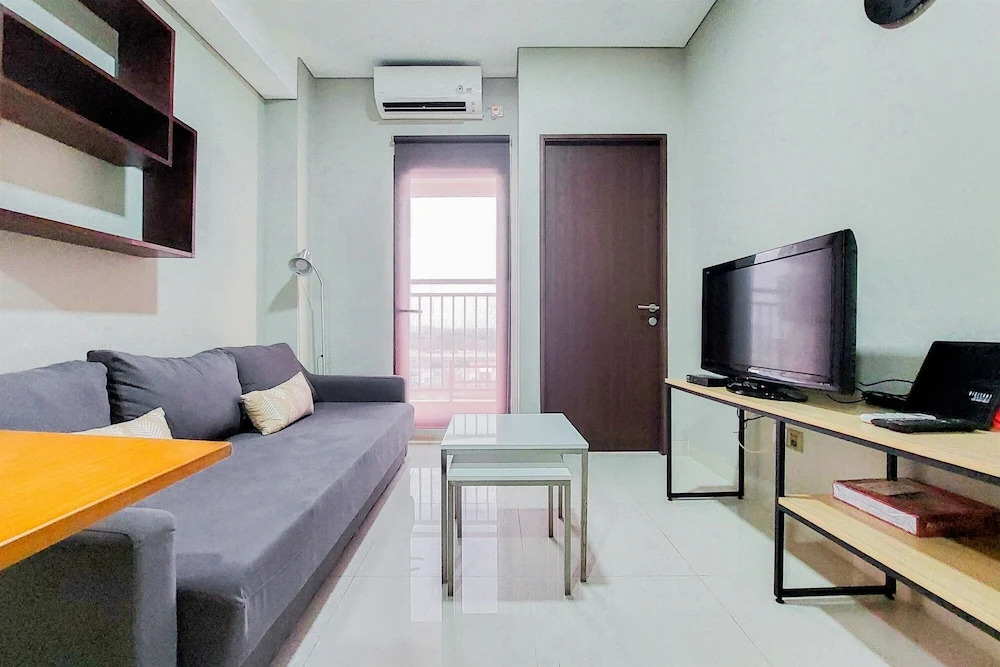 Comfort 1BR at Transpark Bintaro Apartment By Travelio