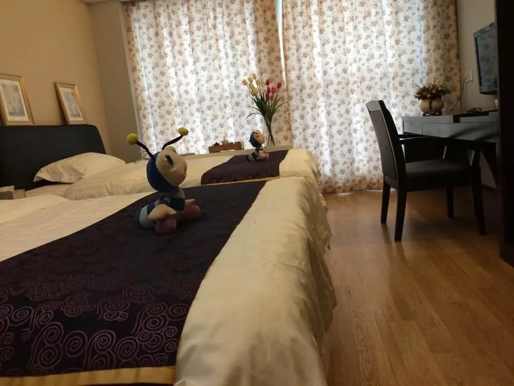 Jinli Xiangzi Boutique Apartment Hotel