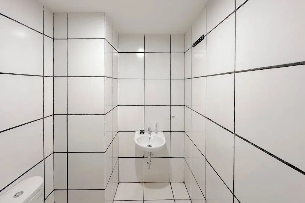 Combined Grey Toned 2Br Apartment At The City Square Surabaya
