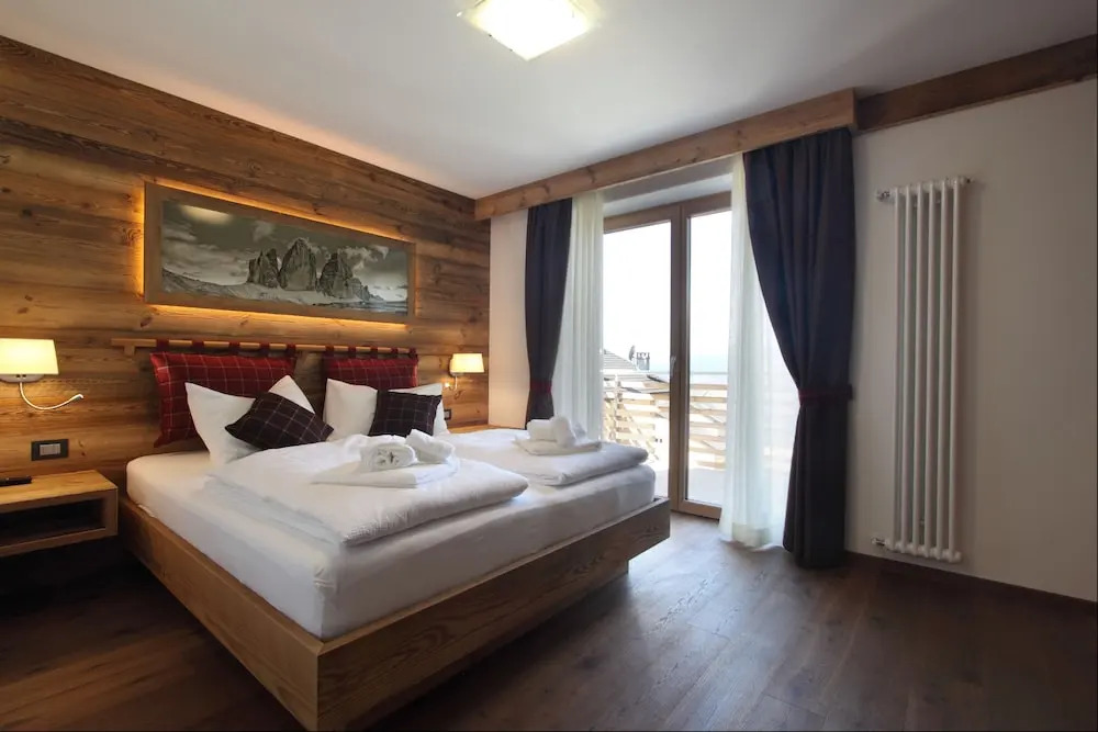 DOLOMITES B&B - Suites, Apartments and SPA