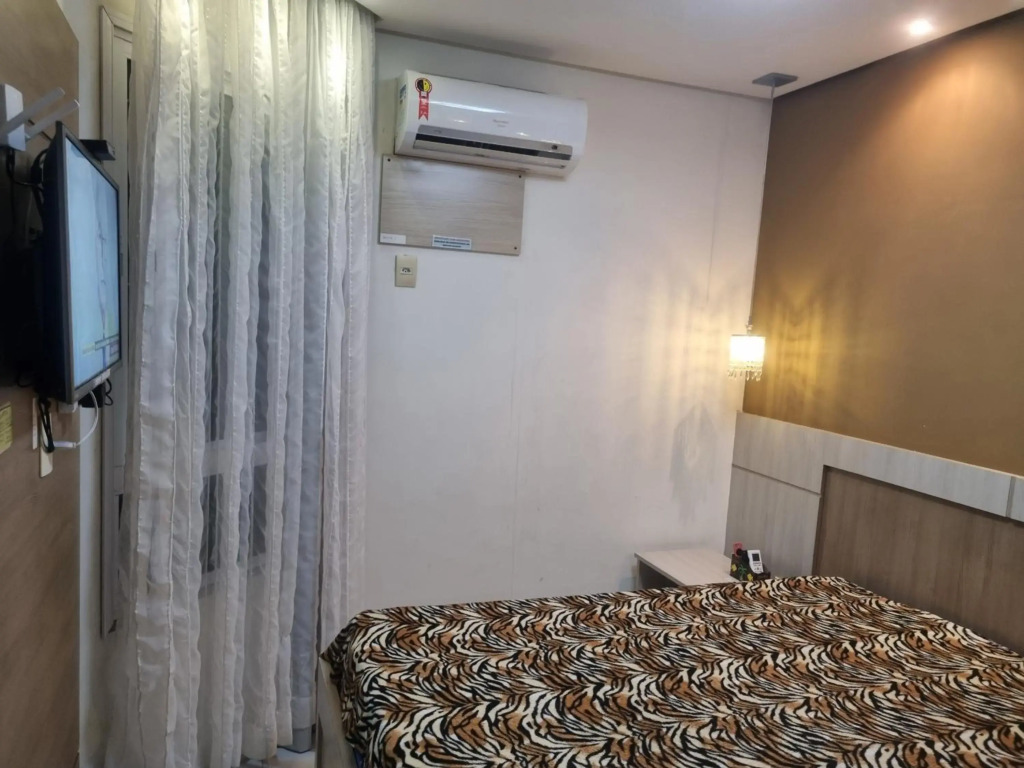 Apartamento FRENTE PARA 0 MAR - PÉ NA AREIA - 3 SUITES COM AR CONDICIONADO, 2- VAGAS DE GARAGEM - FINAMENTE DECORADO - PRAIA DO MORRO-INTERNET -WI-FI -TV COM SERVIÇOS DE DISNEY PLUS - NETFLIX -HBO MAX -STAR MAX - JOGOS AMAZON FIRE STICK - ALEXIA