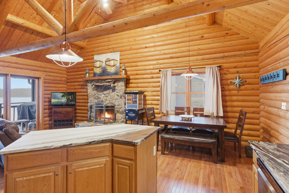 Lakefront Log Cabin With Private Dock, Two Decks & Cozy Comfort at 35mm in Sunrise Beach