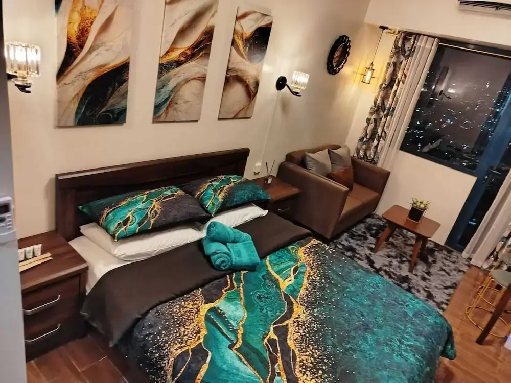 Air Residences-Modern studio w/ City skyline view