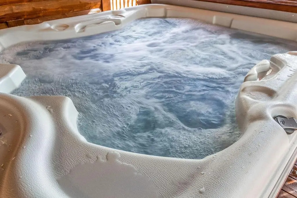 Large Luxury 2BR Cabin w Hot Tub Double Trouble was designed for fun comfort and memories minutes from buzzling Hochatown and beautiful Beaver Bend State Park