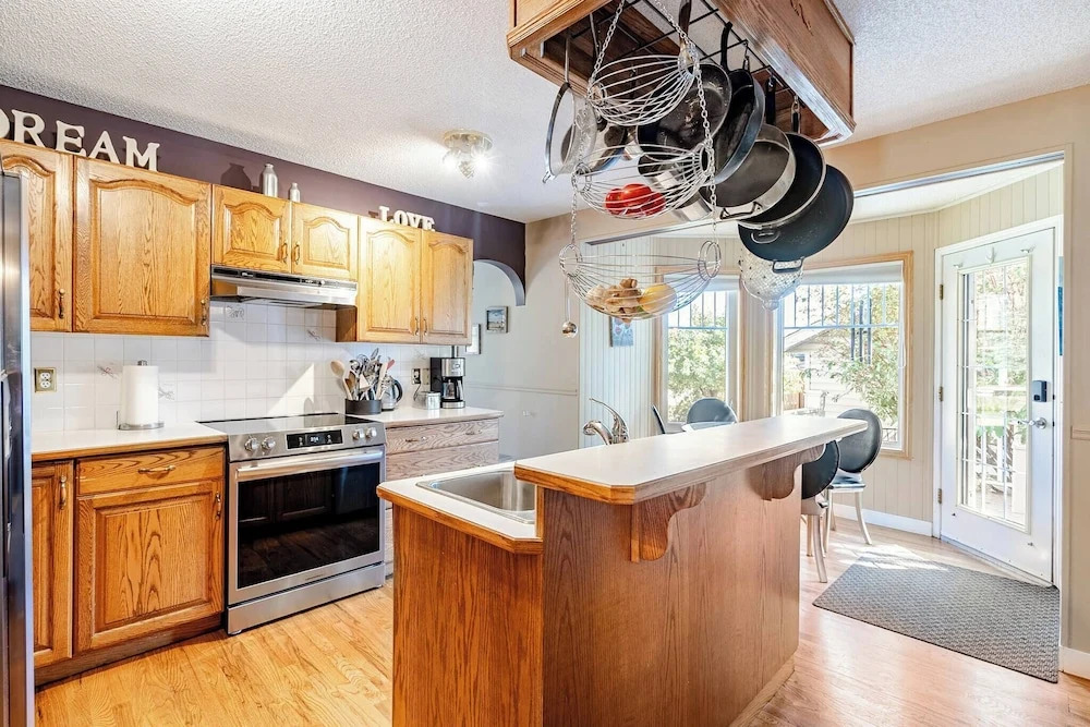 Charming Victorian Home in Okotoks Elegant Comfort & Modern Convenience