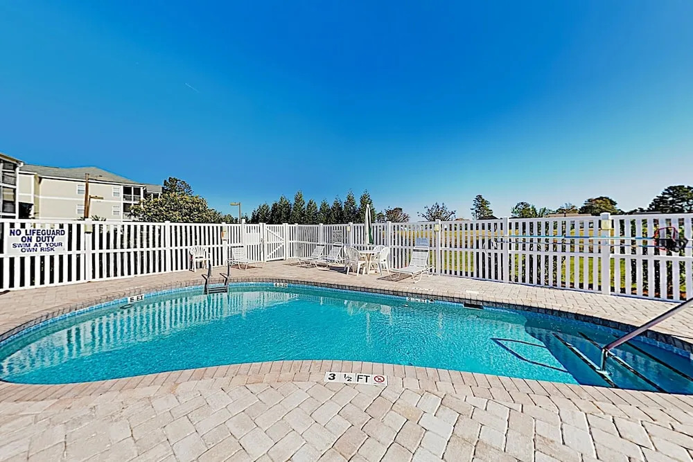 Bright Coastal Condo w/ Pool & Private Balcony condo