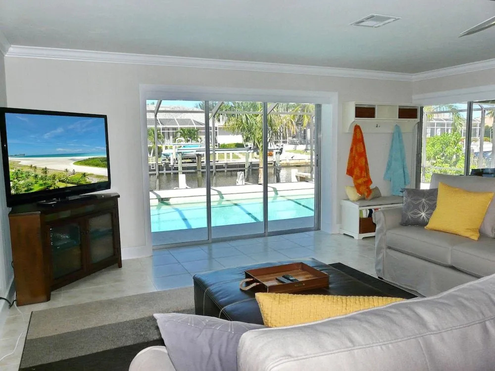 Waterfront home with pool and western exposure