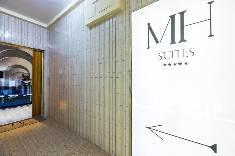 MH SUITES Plebiscito