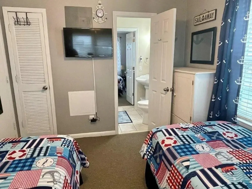 Sandy Bottoms 4 Bedroom Home by RedAwning