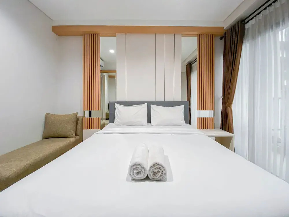 Nice Studio at Patraland Amarta Apartment By Travelio
