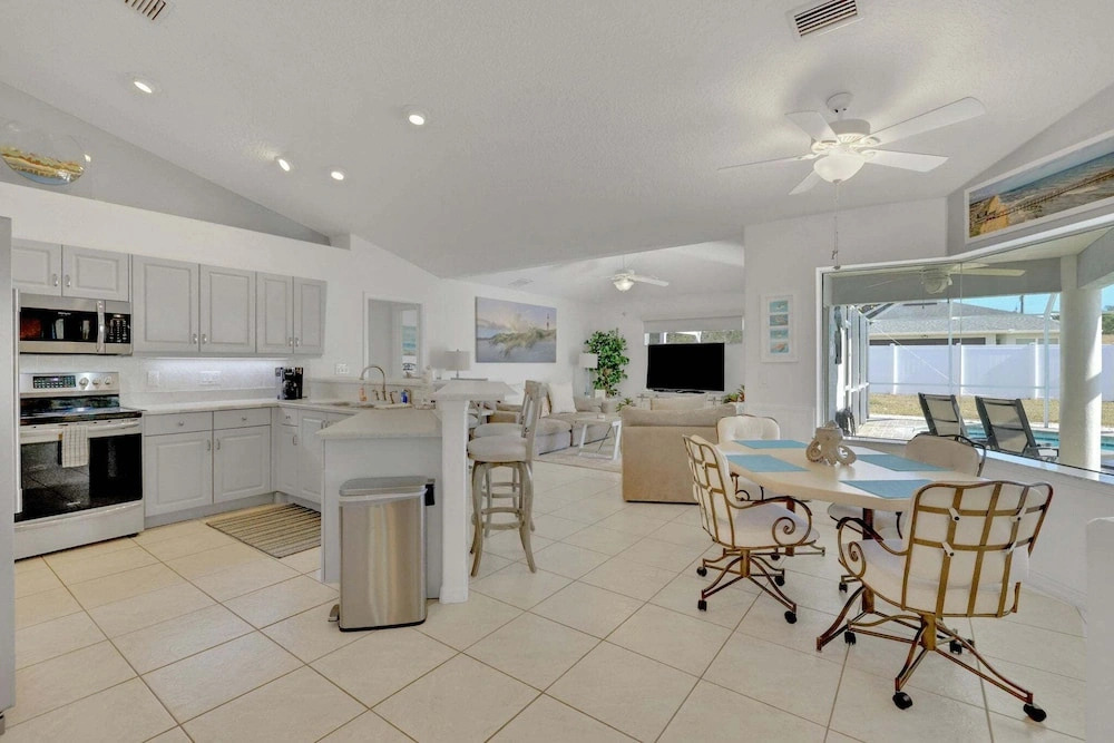 Contemporary Coastal Escape With Heated Pool, Fenced Yard, & Outdoor Dining