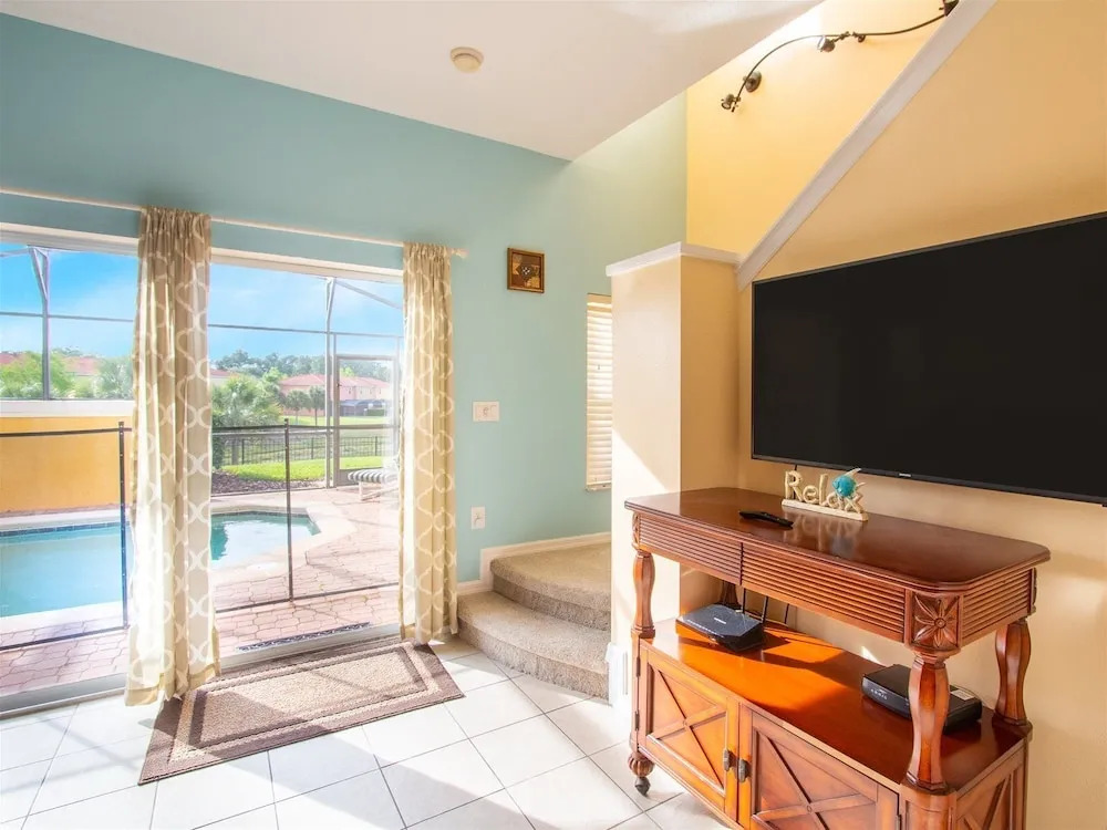 Private Screened Splash Pool Overlooking Tranquil Lake Right Beside Disney World by Florida Dream Homes