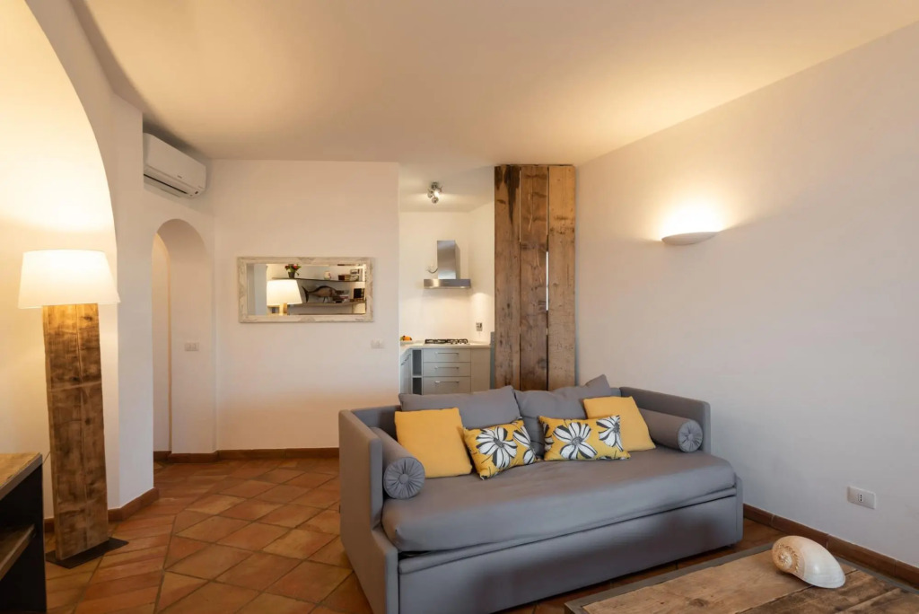 The property includes a double bedroom, a bathroom with a shower, large living room with sofa-bed (f-FIGAROLO1_PP