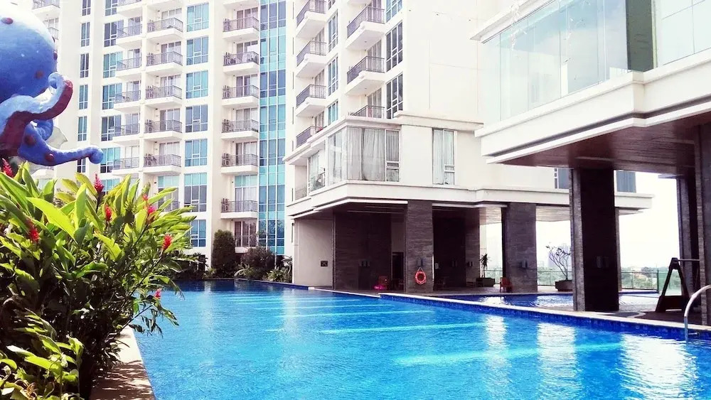 Family Studio Room at Ancol Mansion Apartment By Travelio