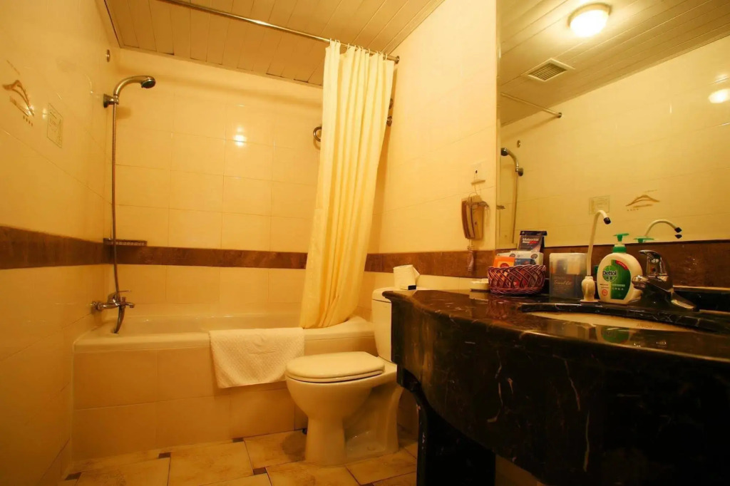 HuaJun Suite Hotel