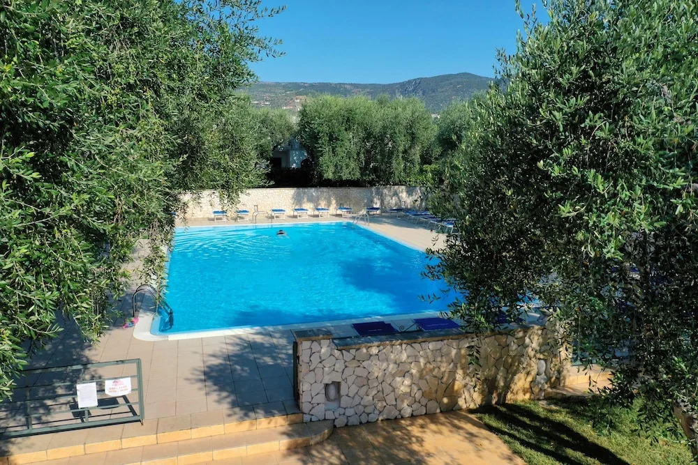 Apartment ulivo with pool and private beach