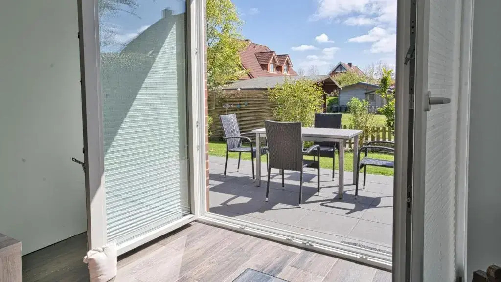Inselparadies - Neubauwohnung mit großer Terrasse, Strandkorb und Garten