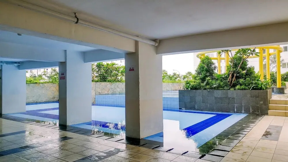 2BR Minimalist Bassura City Apartment By Travelio