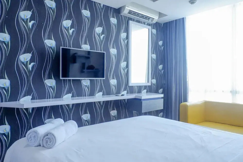 Spacious & Exquisite 1BR Apartment at Tamansari Papilio By Travelio