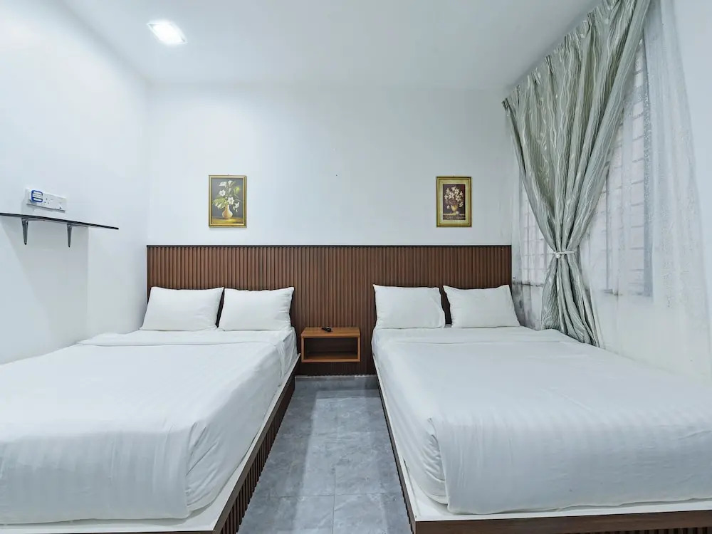 Capital O 90882 Padi Hotel