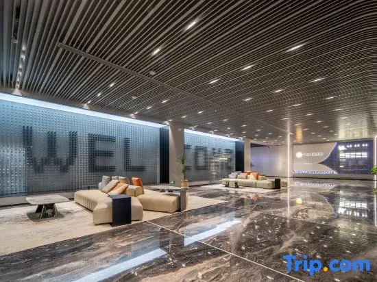 Huayue Kaixuan Grand Hotel (Weiye Building Xincheng Bus Station)