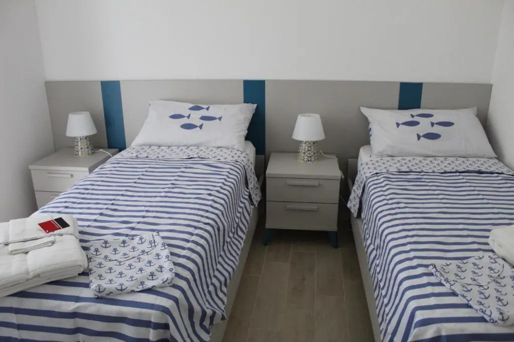 90 secondi dal letto al mare