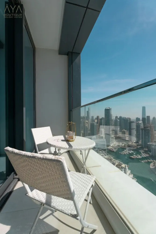 Aya - Canal View From this 1BR in Jumeirah Gate Tower 1