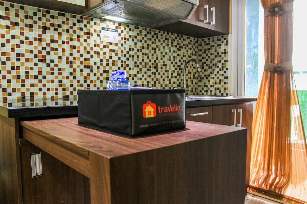 Comfortable and Tranquil 2BR Apartment at Green Pramuka By Travelio