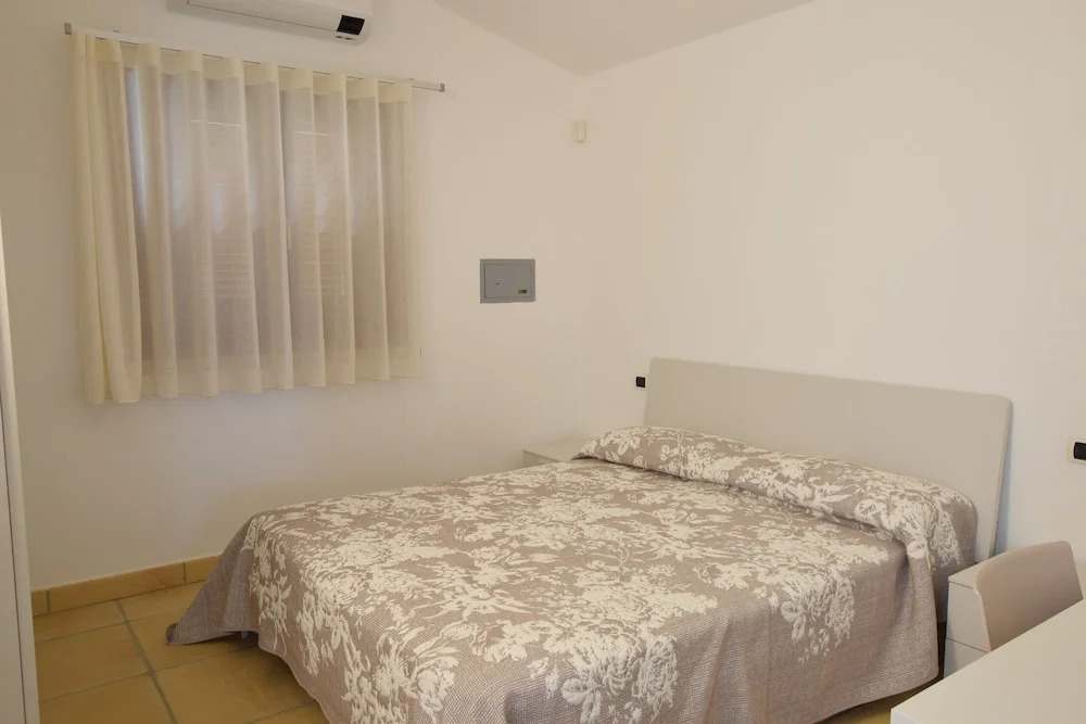 Luisa Apartment In Budoni Shared Pool