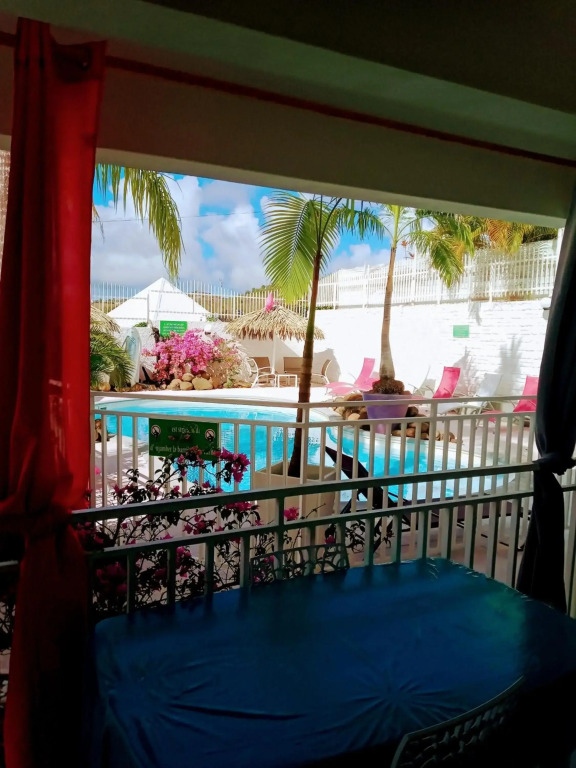 Appartement de 2 chambres avec piscine partagee jardin clos et wifi a Sainte Anne a 3 km de la plage