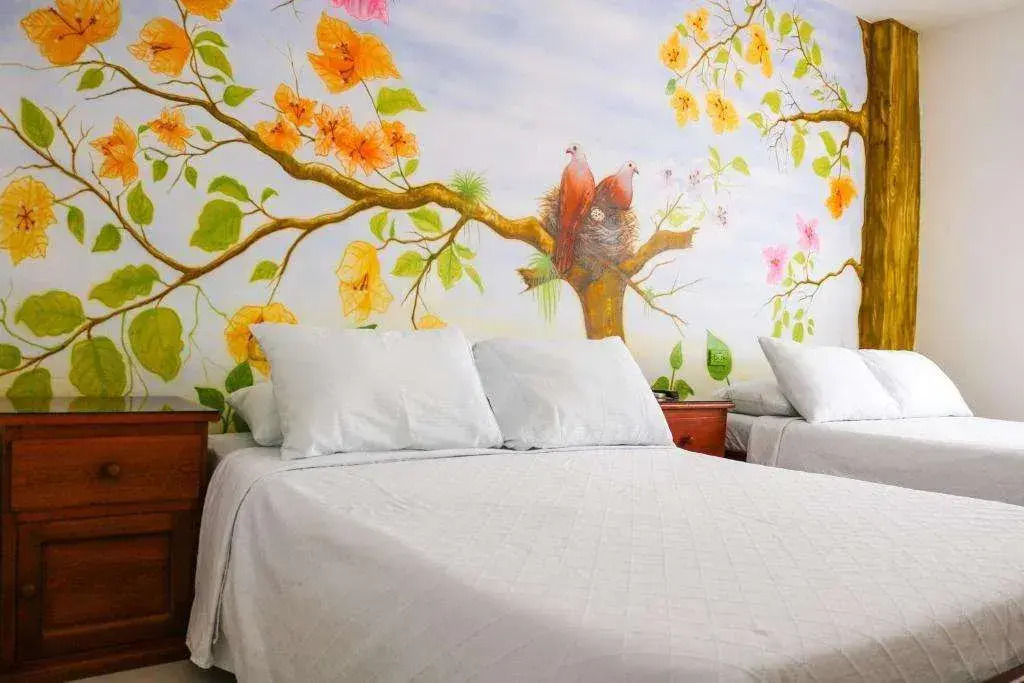 Hotel Jardines Evans By GEH Suites