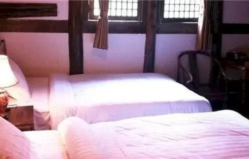 Emeishan Ziranxing Dujiabieyuan Hotel