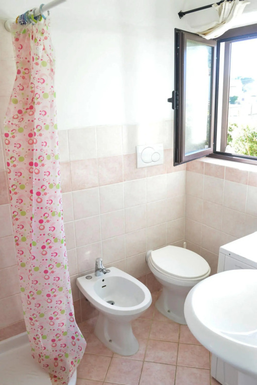 Apartment in Cannigione with garden