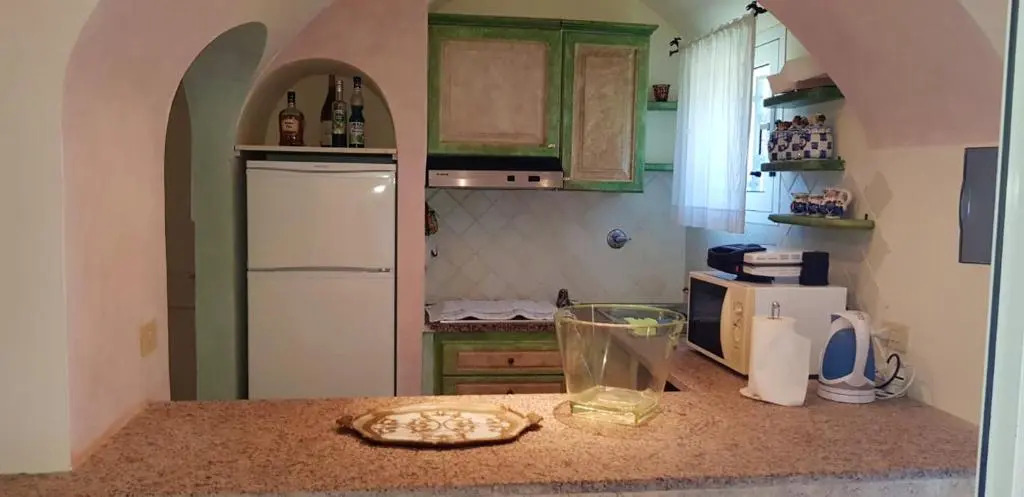 House with 3 bedrooms in Cannigione with wonderful sea view enclosed garden and WiFi 600 m from the beach