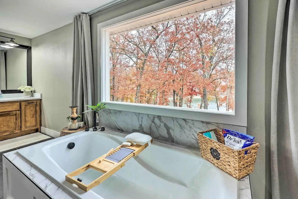 Lakefront Rogers Getaway w/ Hot Tub & Deck!