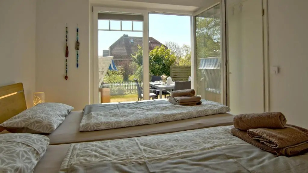Inselparadies - Neubauwohnung mit großer Terrasse, Strandkorb und Garten