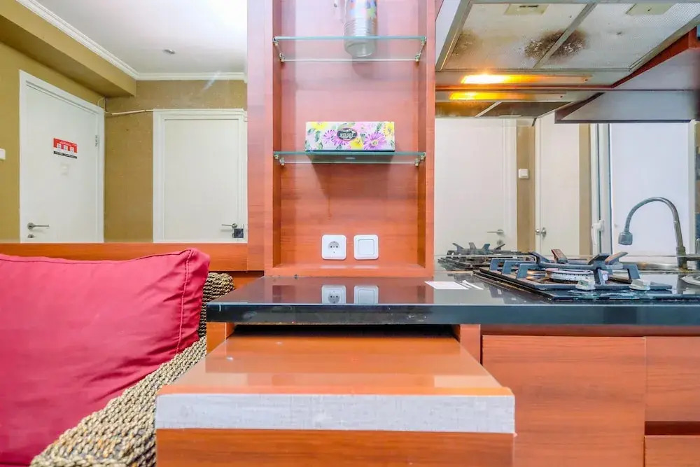 Comfy and Great Choice 2BR Green Pramuka City Apartment By Travelio