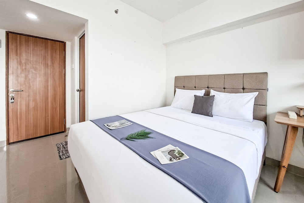 Compact White Studio At Cisauk Point Apartment