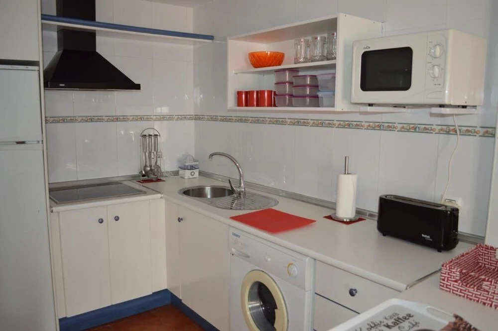 Ground floor apt facing the nudist beach, with private patio & East orientation
