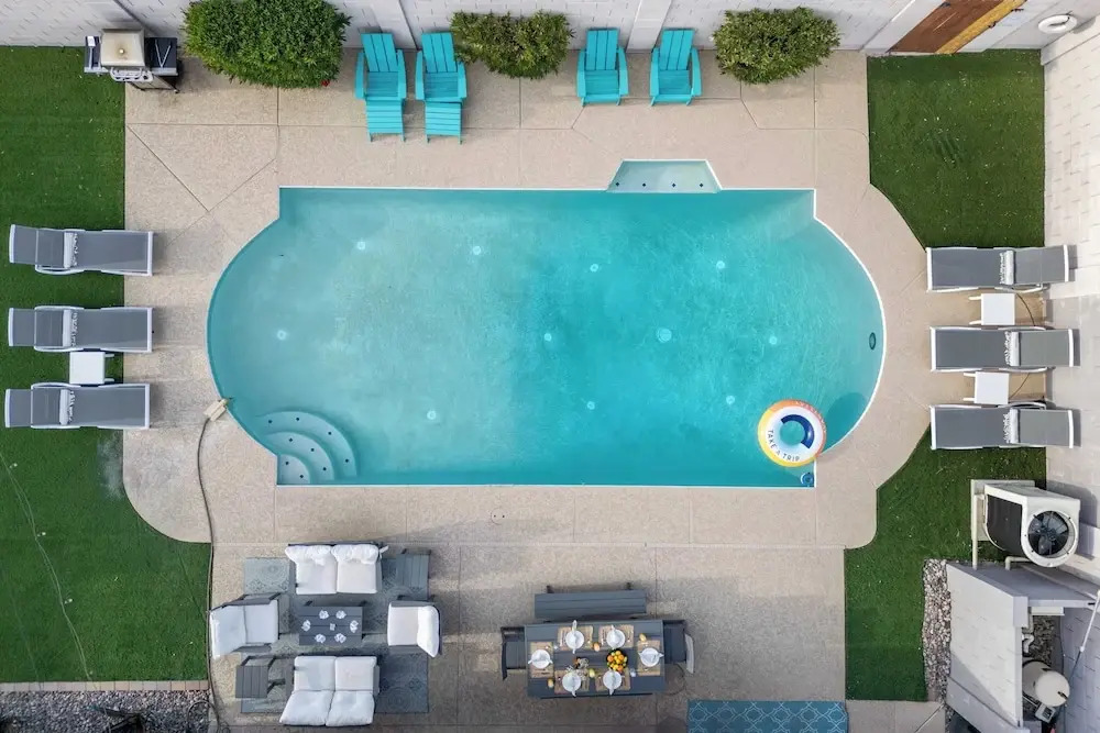 Private Pool + Outdoor Oasis 5mins to Old Town Indianola Oasis by Avantstay
