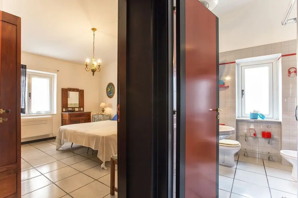 Alghero, Lighthouse Penthouse with sea view and beach front