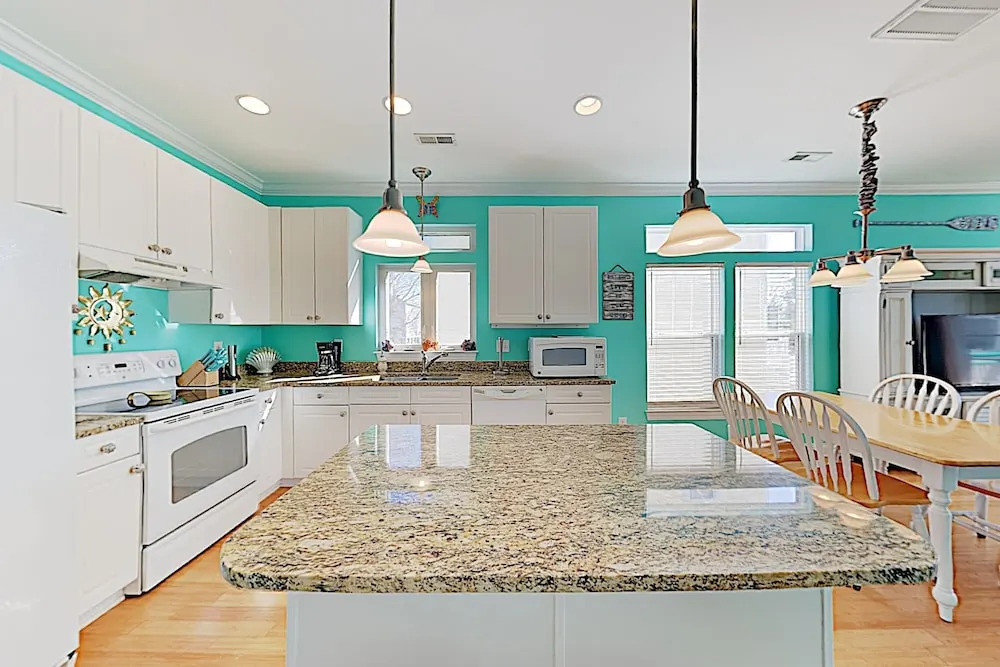 New Listing! Coastal Gem W/ Balconies, Near Beach 4 Bedroom Duplex