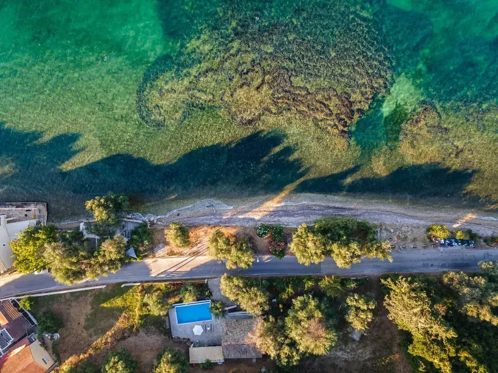Deja Blue Beach Pool House by Estia