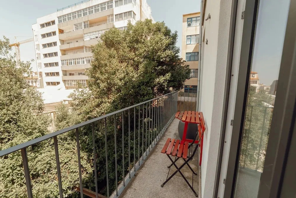 Downtown Bright Balcony Apartment by Vacationy