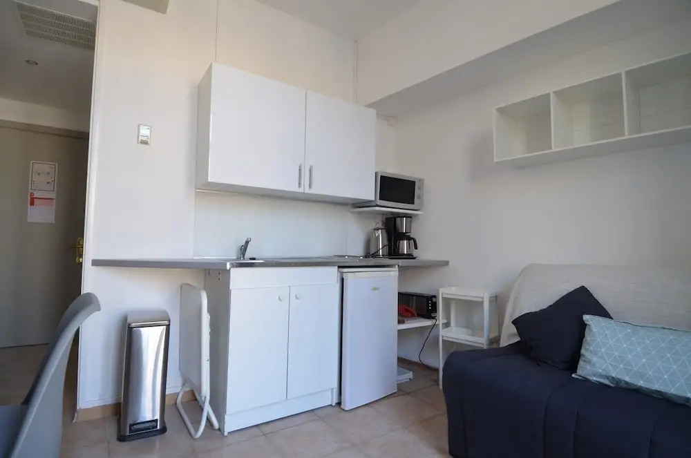 Studio in front of main train station in Nice near tramway